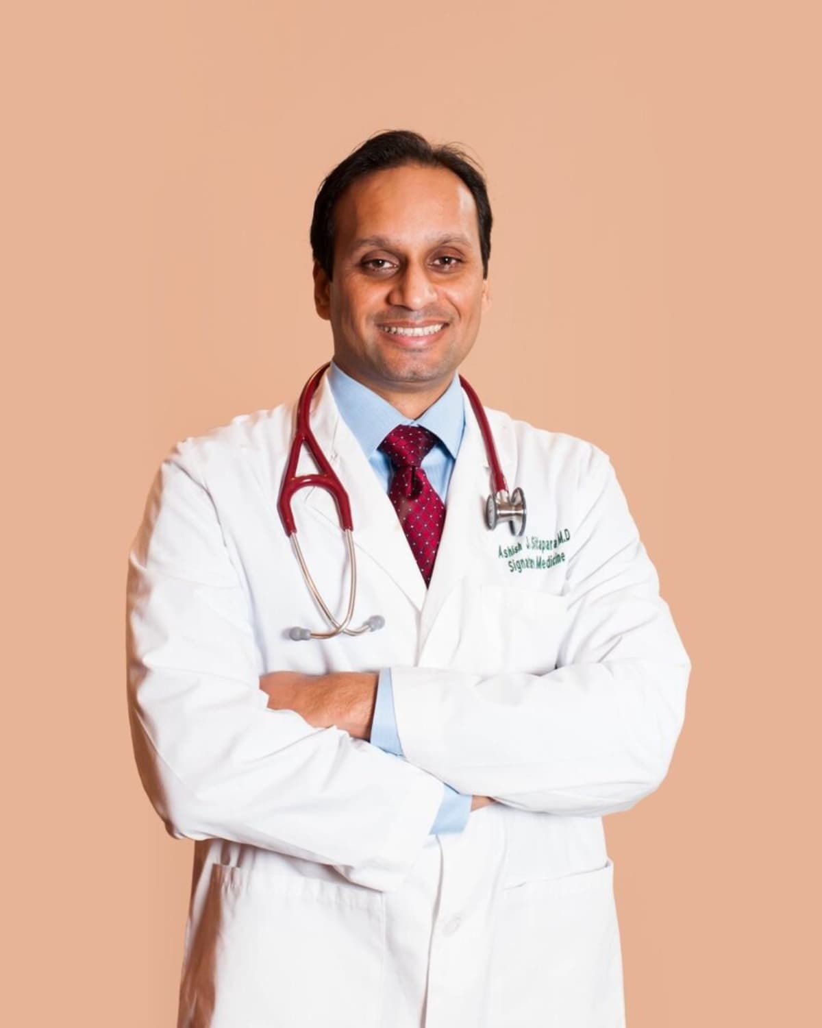 Portrait of Dr. Ashish Sitapara, MD, founder of Signature Medicine in Newtown, Pennsylvania.