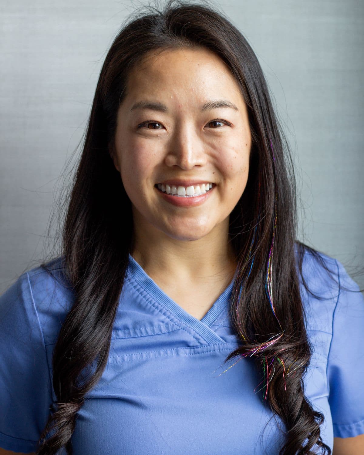 Portrait of Dr. Connie Shim-Middleton, DDS, co-owner of Middleton Family Dentistry in Fort Wayne, Indiana, dental clinical reviewer for Macbach.